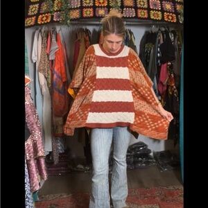 Morgan Factory upcycle top with a sweater and cape sleeves.